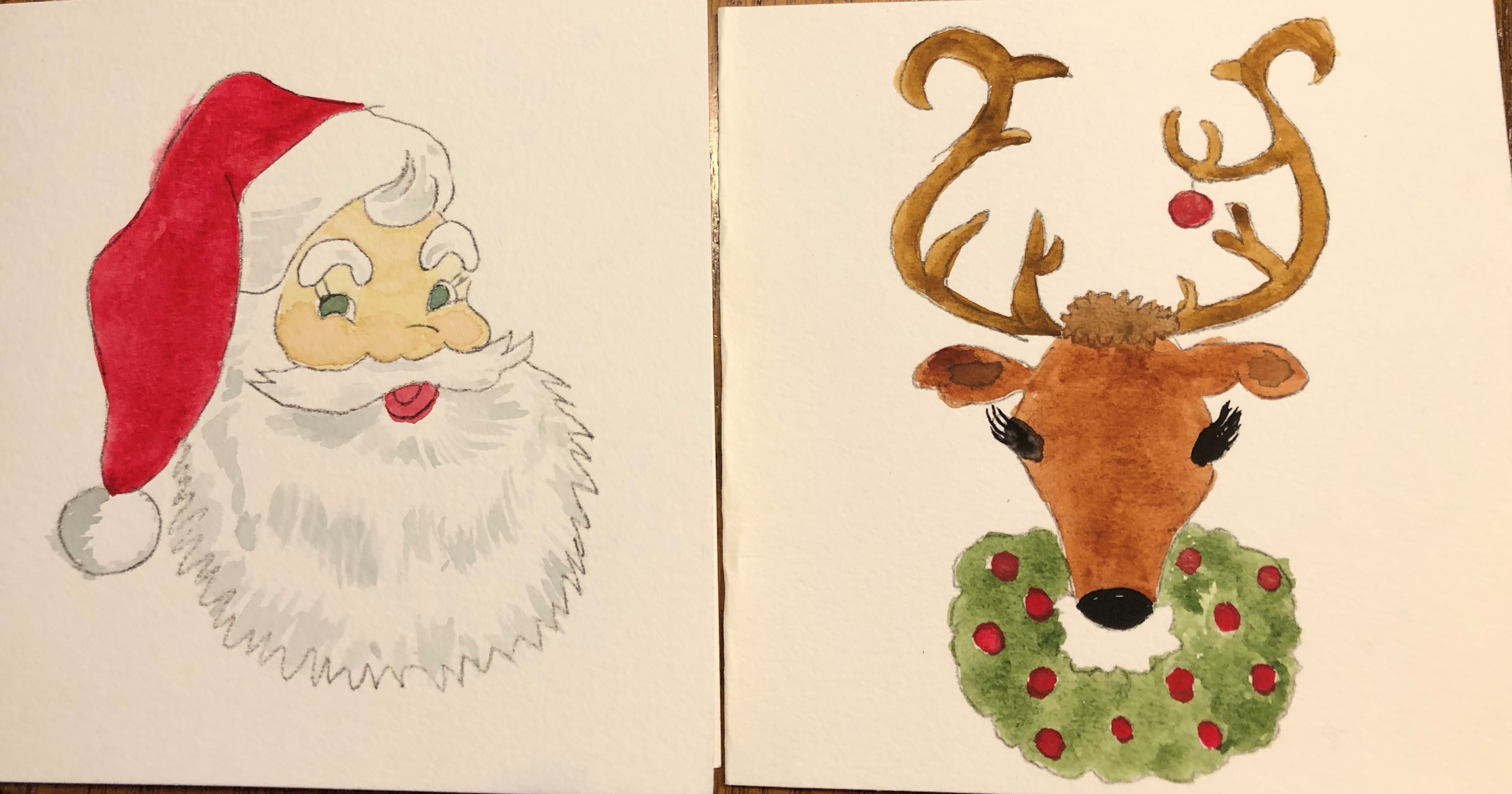 Watercolor painting of Santa and a brown reindeer with antlers and a green wreath