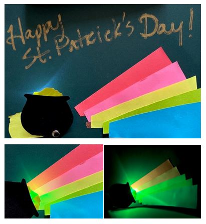 Greeting card with text Happy St. Patrick's Day and an illuminated pot of gold with rainbow