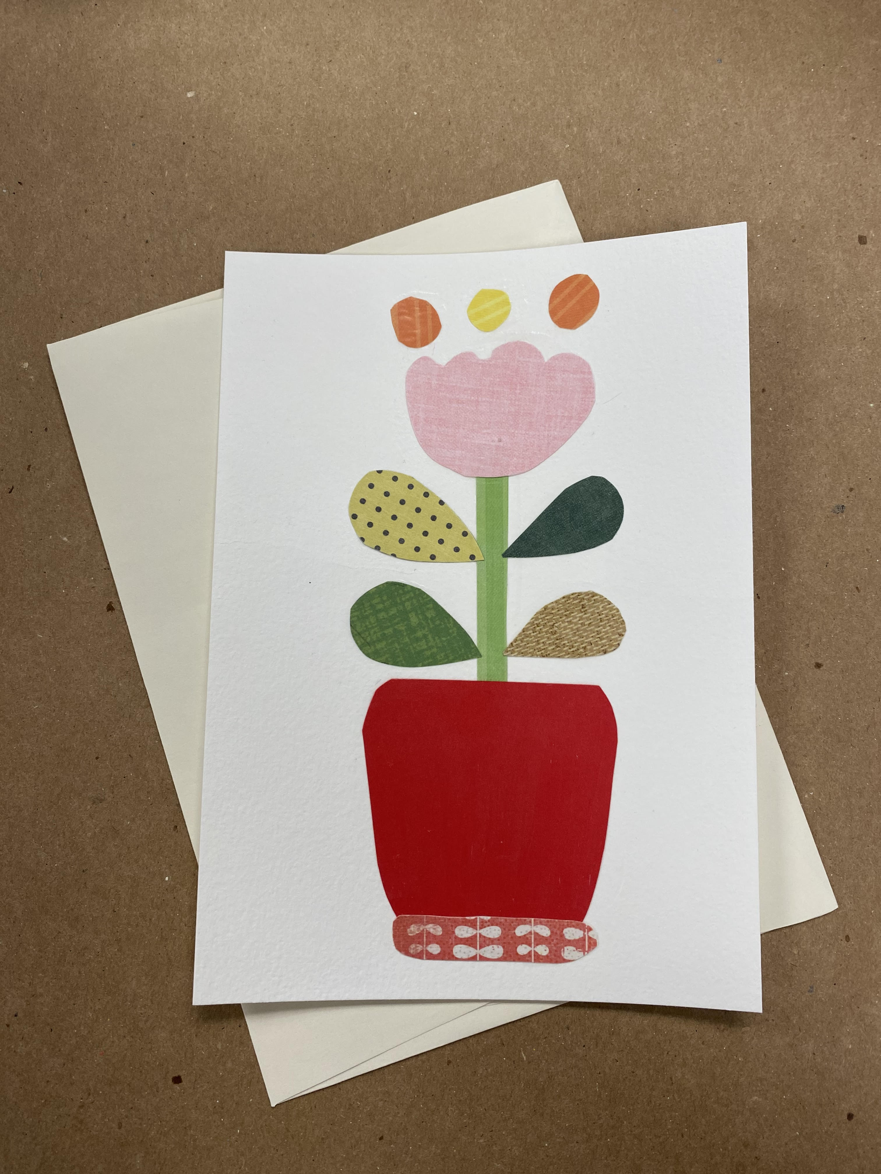 Card with collage of pink flower in a red pot