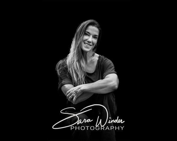 Black and white photo of photographer Sara Winder