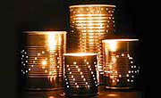 A photo of 3 tin can luminaries