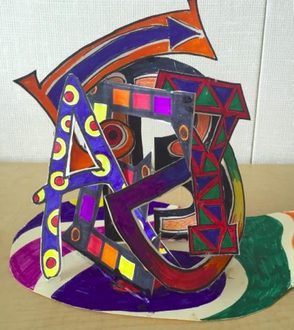 cardboard letter sculpture