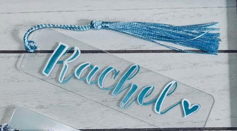 Bookmark with decorative text and blue tassel