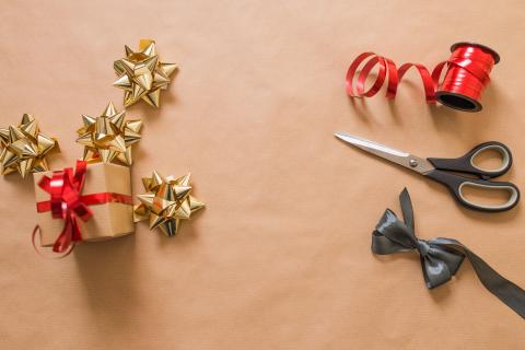 wrapping supplies like bows, scissors, and ribbon