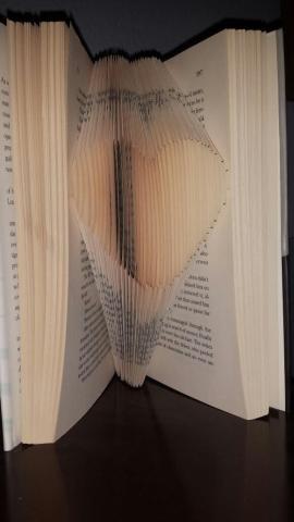 Picture of book pages folded into heart shape