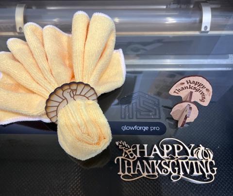Wooden turkey, Happy Thanksgiving sign, and turkey napkin ring