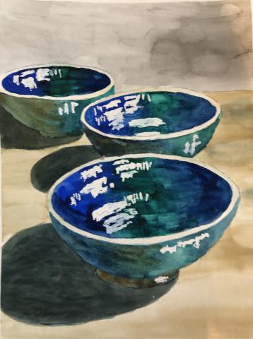 Watercolor painting of three pottery bowls in blues and greens