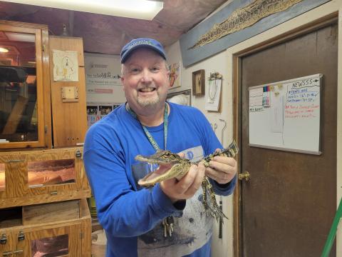 Mr. B holding a small alligator