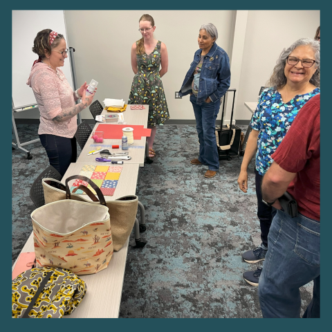 teacher and class members talking about fiber arts