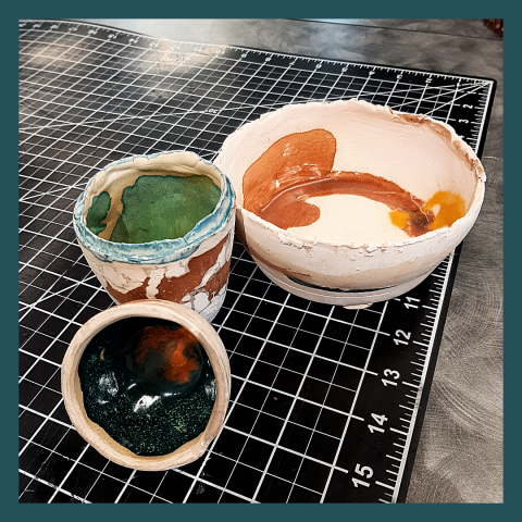 glazed ceramic bowls and cups
