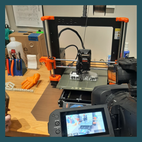 A Prusa 3D Printer, printing a Cyber Truck, at the Mammen Family Public Library's Makerspace
